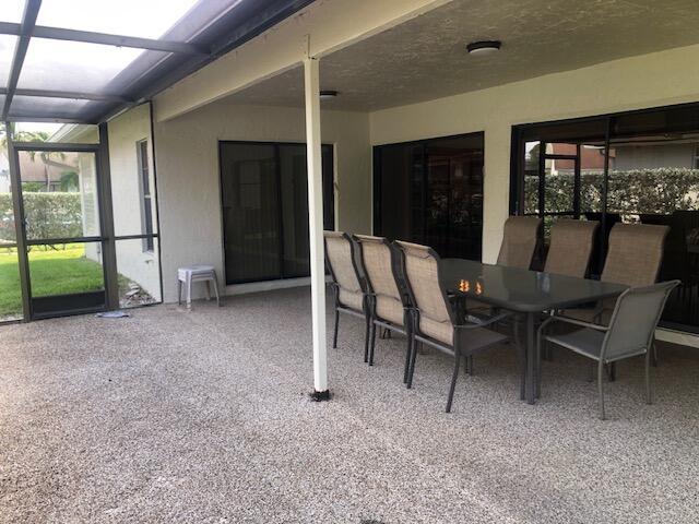 7992 Chula Vista Cres, Boca Raton, FL 33433 - sunroom featuring outdoor dining space