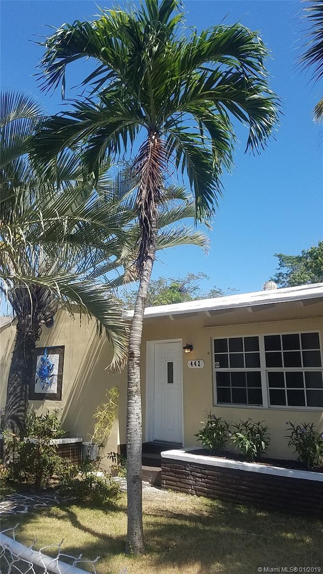 440 NE 1st Ave, Fort Lauderdale, FL 33301 - property entrance featuring stucco siding