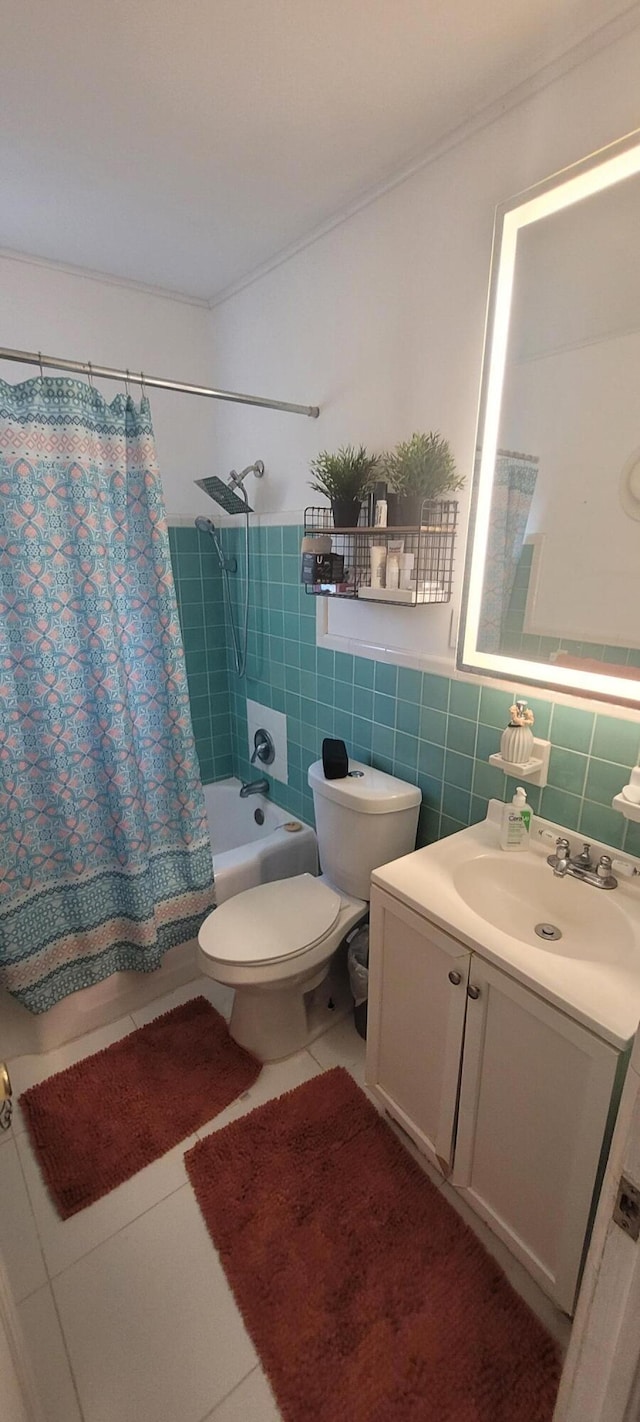 440 NE 1st Ave, Fort Lauderdale, FL 33301 - bathroom featuring shower / tub combo, vanity, tile walls, and ornamental molding
