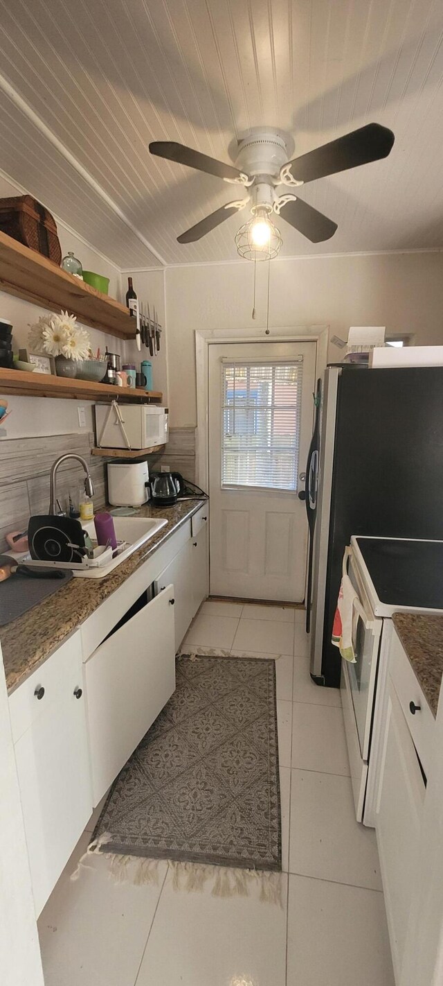 440 NE 1st Ave, Fort Lauderdale, FL 33301 - kitchen featuring white appliances, white cabinets, light tile patterned floors, ceiling fan, and wood ceiling