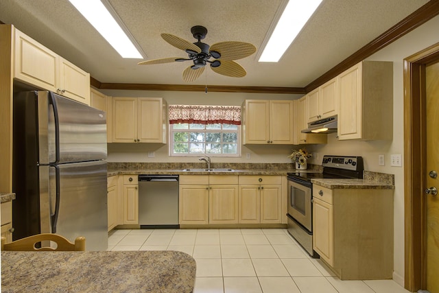 5176 Palm Way N, Lake Worth, FL 33463 - kitchen featuring appliances with stainless steel finishes, under cabinet range hood, light brown cabinetry, crown molding, and a textured ceiling