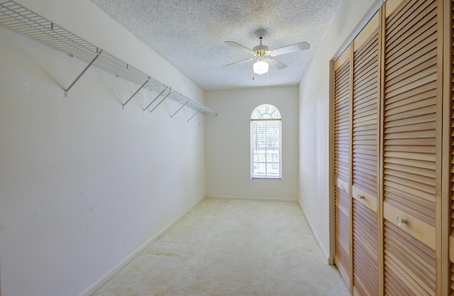 5176 Palm Way N, Lake Worth, FL 33463 - spacious closet featuring carpet flooring and ceiling fan