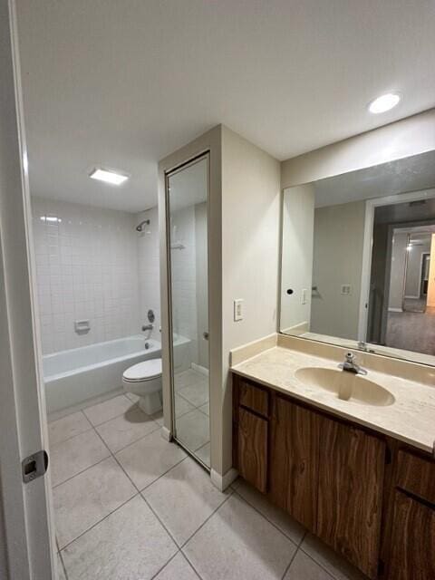 3310 33rd Way, West Palm Beach, FL 33407 - full bath with tile patterned floors, vanity, and bathtub / shower combination