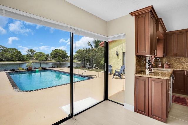 6526 Sweet Maple Ln, Boca Raton, FL 33433 - view of swimming pool with a sink and a water view