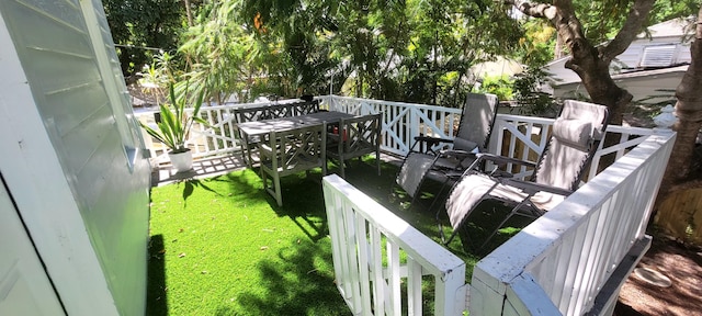 104 NE 5th St, Fort Lauderdale, FL 33301 - view of green lawn with a deck