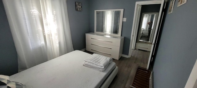 104 NE 5th St, Fort Lauderdale, FL 33301 - bedroom with wood finished floors and baseboards
