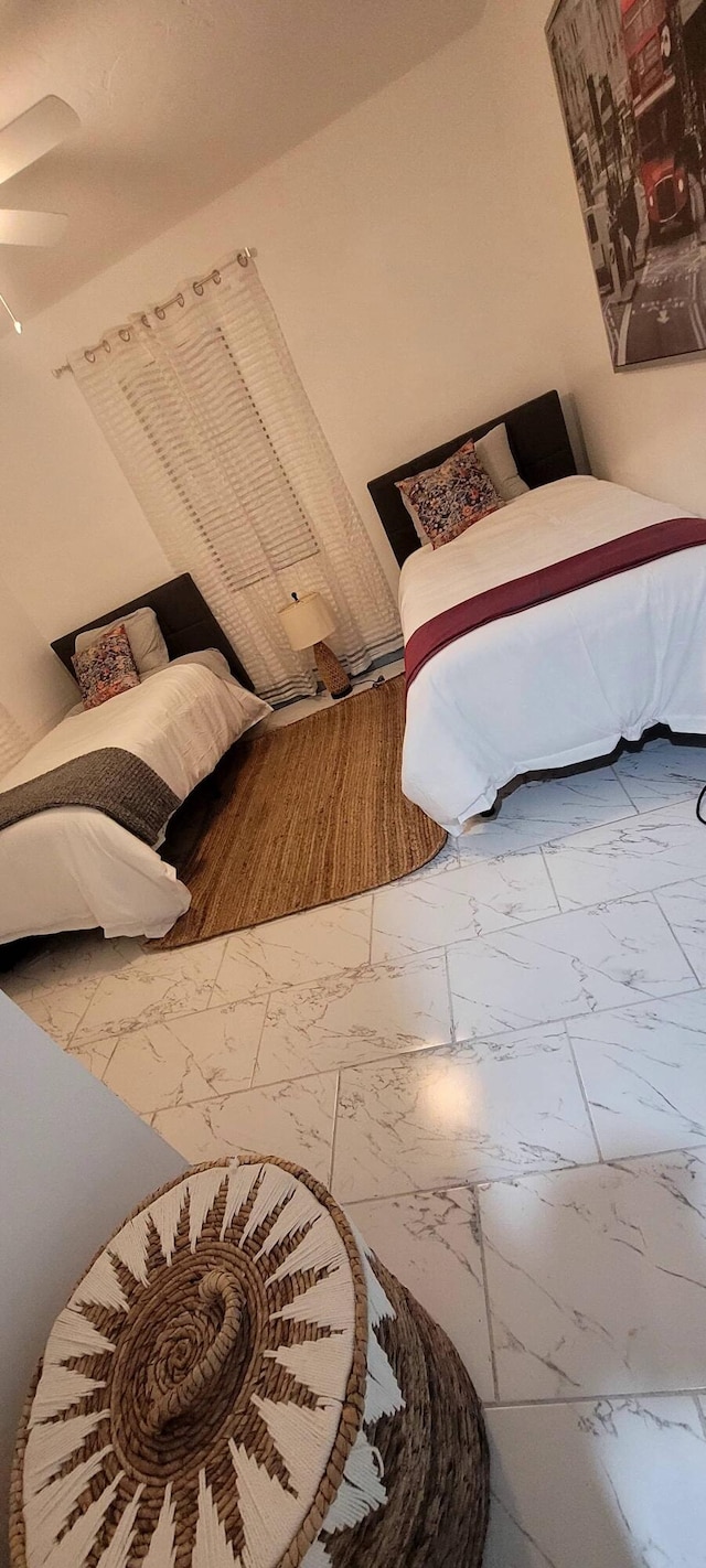 104 NE 5th St, Fort Lauderdale, FL 33301 - bedroom with marble finish flooring