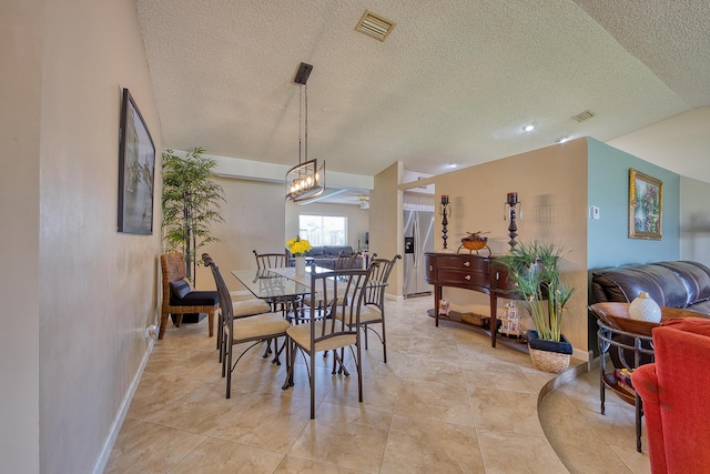 5330 NW 31st St, Margate, FL 33063 - dining space with a textured ceiling, a chandelier, and recessed lighting