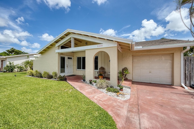 5330 NW 31st St, Margate, FL 33063 - view of front of home featuring stucco siding, an attached garage, and driveway