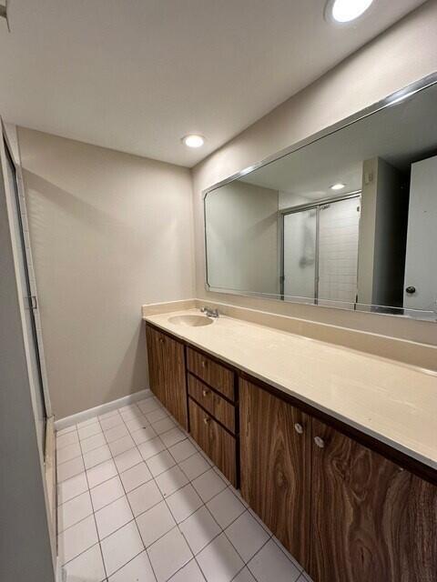 3819 38th Way, West Palm Beach, FL 33407 - full bath with vanity, a shower stall, and tile patterned flooring