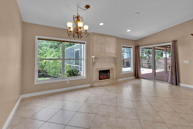 1070 SW Jennifer Ter, Port Saint Lucie, FL 34953 - unfurnished living room featuring healthy amount of natural light, a chandelier, light tile patterned floors, recessed lighting, and lofted ceiling