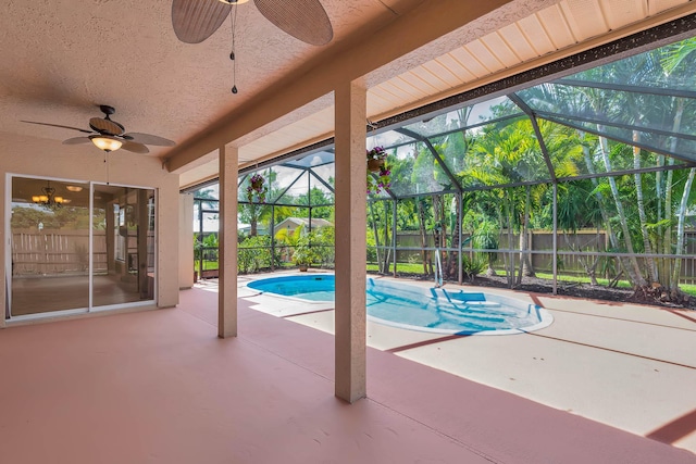 1070 SW Jennifer Ter, Port Saint Lucie, FL 34953 - view of swimming pool featuring ceiling fan, a patio, a fenced backyard, and a lanai