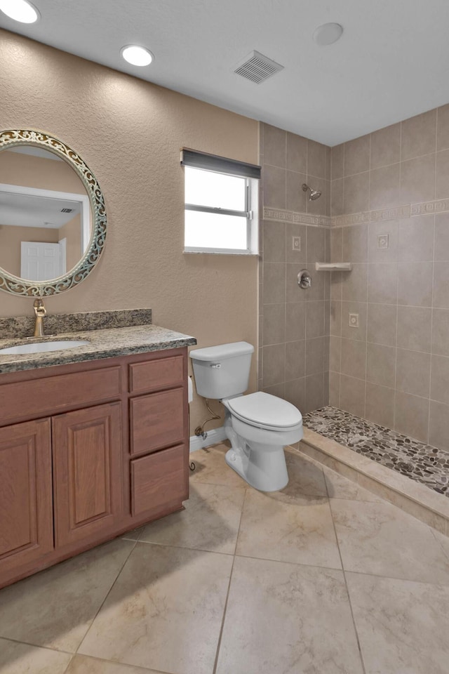1070 SW Jennifer Ter, Port Saint Lucie, FL 34953 - full bath featuring a tile shower and vanity