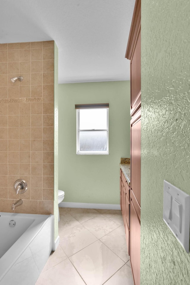 1070 SW Jennifer Ter, Port Saint Lucie, FL 34953 - bathroom featuring vanity, shower / bath combination, and tile patterned floors