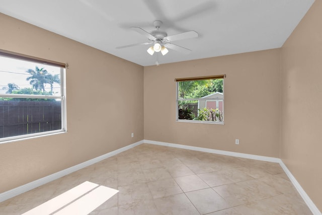 1070 SW Jennifer Ter, Port Saint Lucie, FL 34953 - spare room featuring ceiling fan and light tile patterned flooring