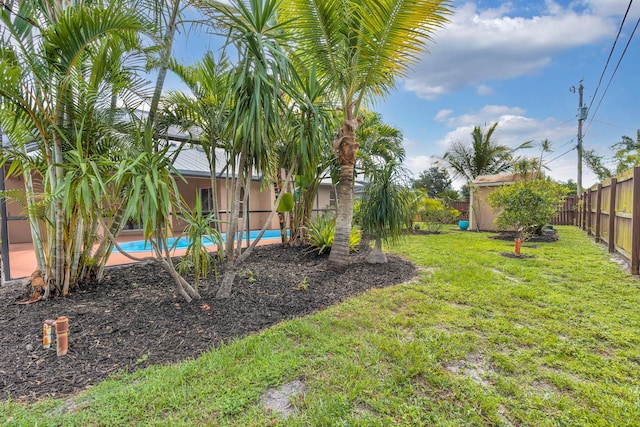 1070 SW Jennifer Ter, Port Saint Lucie, FL 34953 - fenced backyard with a storage shed