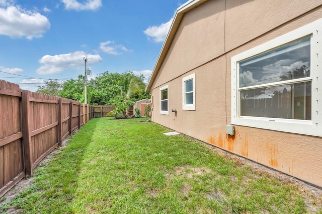1070 SW Jennifer Ter, Port Saint Lucie, FL 34953 - fenced backyard with a shed