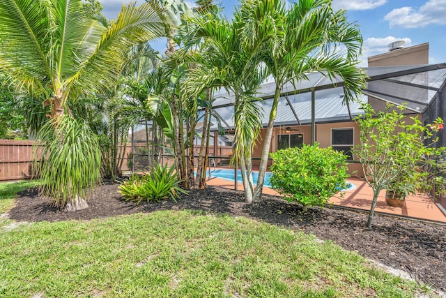 1070 SW Jennifer Ter, Port Saint Lucie, FL 34953 - view of yard featuring ceiling fan, a lanai, and a patio area