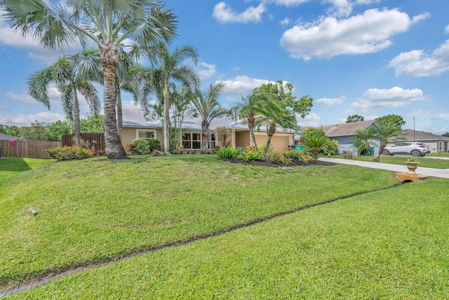 1070 SW Jennifer Ter, Port Saint Lucie, FL 34953 - view of front of property with concrete driveway and stucco siding