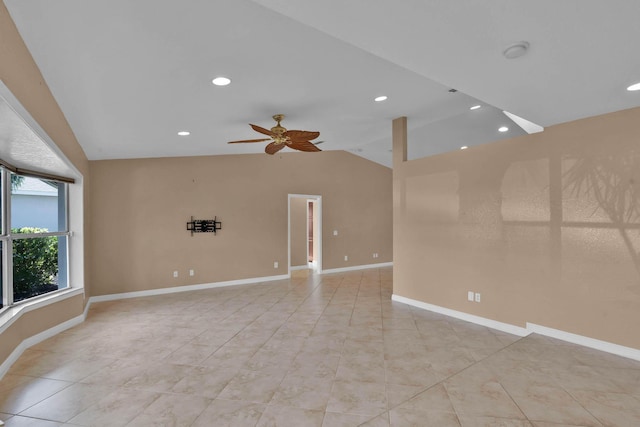 1070 SW Jennifer Ter, Port Saint Lucie, FL 34953 - spare room with vaulted ceiling, recessed lighting, ceiling fan, light tile patterned floors, and a smoke detector
