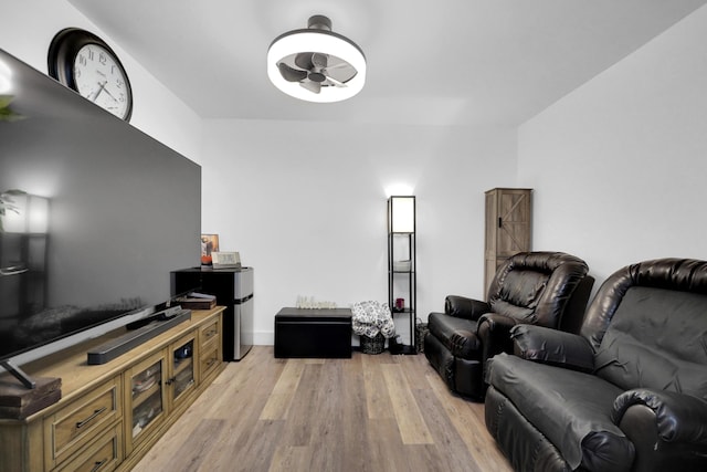 2626 Garfield St, Hollywood, FL 33020 - living room featuring ceiling fan and light wood-type flooring