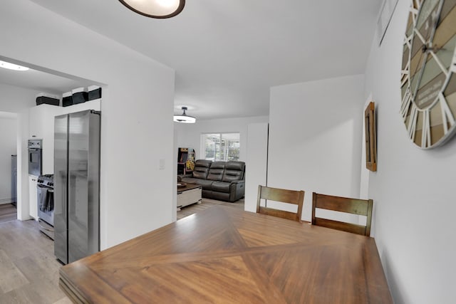 2626 Garfield St, Hollywood, FL 33020 - dining room with light wood finished floors