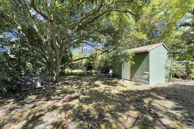 2626 Garfield St, Hollywood, FL 33020 - view of yard featuring a storage unit