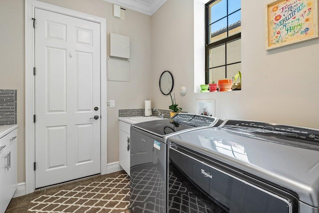 8199 Lost Creek Ln, Delray Beach, FL 33446 - laundry room with cabinet space, washer and dryer, and ornamental molding