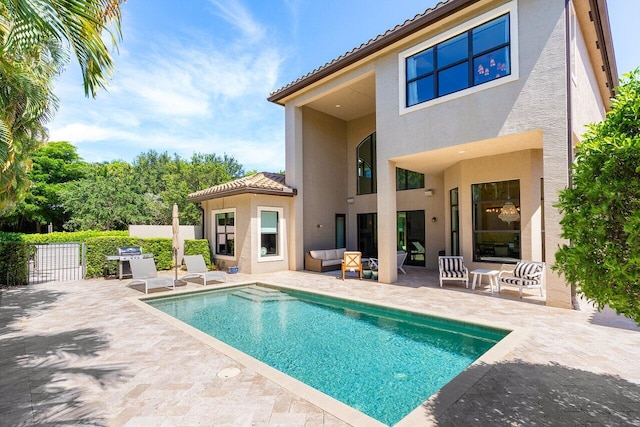 8199 Lost Creek Ln, Delray Beach, FL 33446 - view of swimming pool with a patio and outdoor lounge area