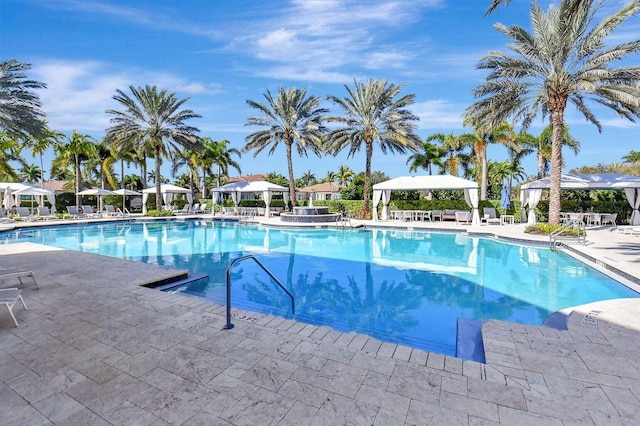 8199 Lost Creek Ln, Delray Beach, FL 33446 - community pool with a patio area