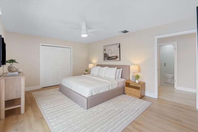 401 Vision Ct, Palm Beach Gardens, FL 33418 - bedroom featuring light wood-type flooring, a closet, and a ceiling fan