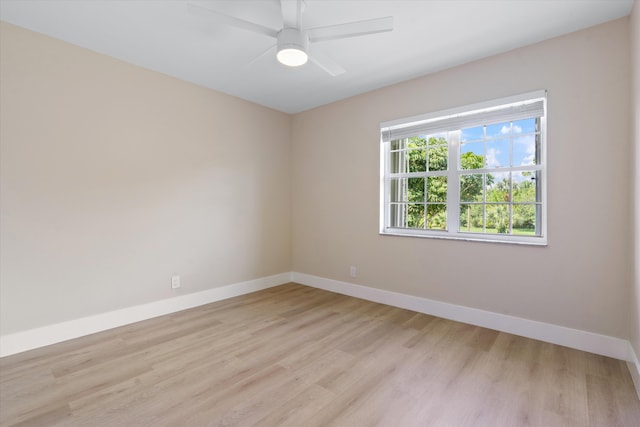 401 Vision Ct, Palm Beach Gardens, FL 33418 - spare room with light wood finished floors and ceiling fan