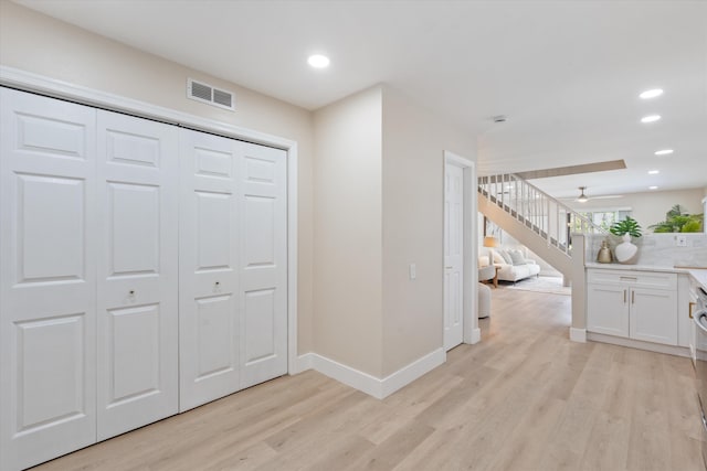 401 Vision Ct, Palm Beach Gardens, FL 33418 - foyer entrance with light wood finished floors, recessed lighting, a ceiling fan, and stairs