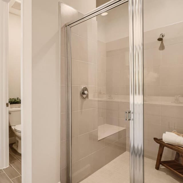 13837 Hero Path, Delray Beach, FL 33484 - full bathroom featuring a stall shower and tile patterned floors