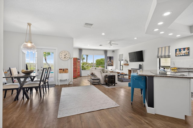 31 Dunbar Rd, Palm Beach Gardens, FL 33418 - living area with recessed lighting, ceiling fan, and dark wood-style floors