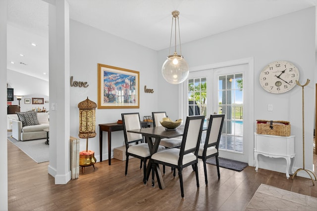 31 Dunbar Rd, Palm Beach Gardens, FL 33418 - dining space with wood finished floors and baseboards