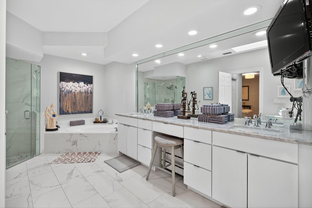 31 Dunbar Rd, Palm Beach Gardens, FL 33418 - bathroom with a garden tub, double vanity, a marble finish shower, recessed lighting, and marble finish floors