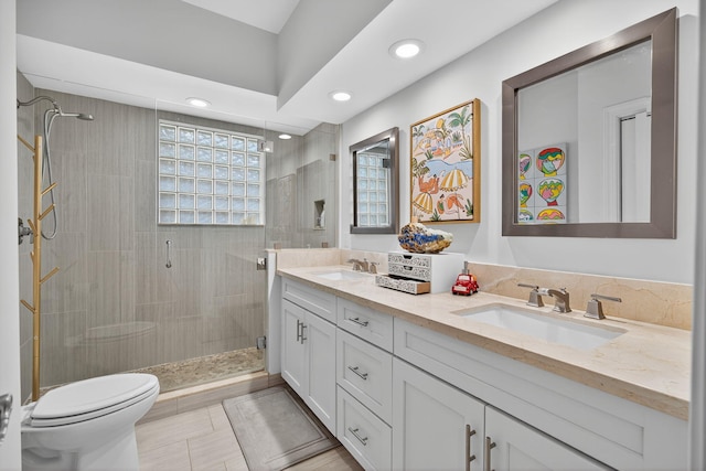 31 Dunbar Rd, Palm Beach Gardens, FL 33418 - bathroom featuring double vanity, a stall shower, and recessed lighting
