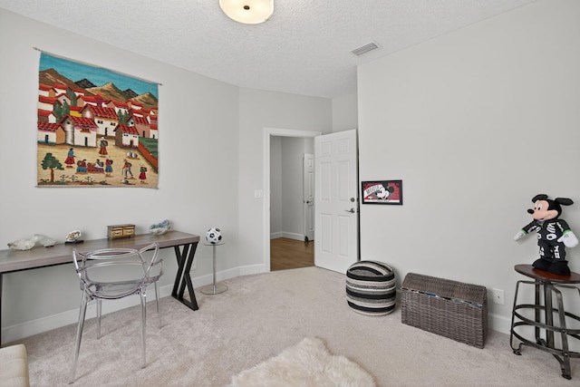 31 Dunbar Rd, Palm Beach Gardens, FL 33418 - office area featuring carpet floors and a textured ceiling