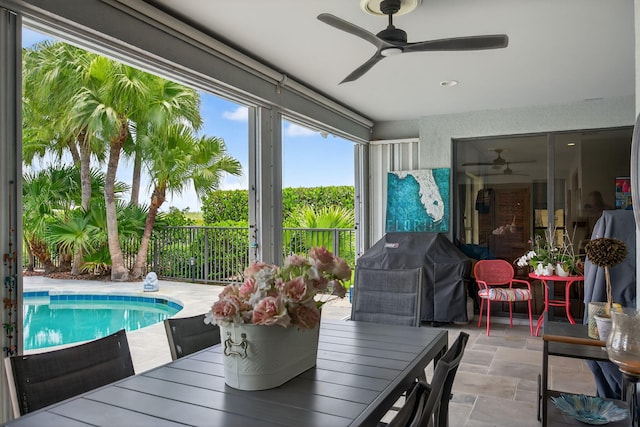 31 Dunbar Rd, Palm Beach Gardens, FL 33418 - sunroom / solarium featuring stone finish floors and recessed lighting