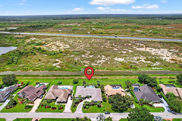 31 Dunbar Rd, Palm Beach Gardens, FL 33418 - aerial view of residential area with a nearby body of water