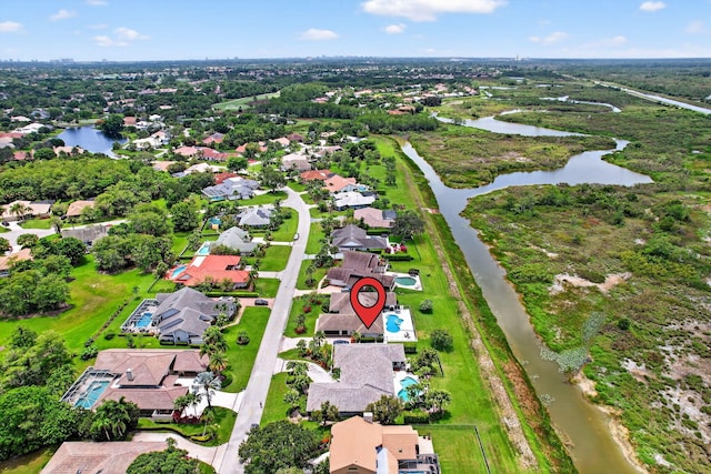 31 Dunbar Rd, Palm Beach Gardens, FL 33418 - aerial view of residential area featuring a nearby body of water
