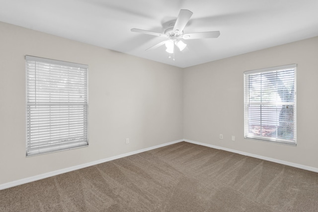 1360 39th Ave, Vero Beach, FL 32960 - carpeted empty room with ceiling fan and baseboards