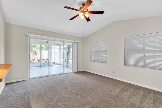 1360 39th Ave, Vero Beach, FL 32960 - empty room featuring carpet, lofted ceiling, and a ceiling fan