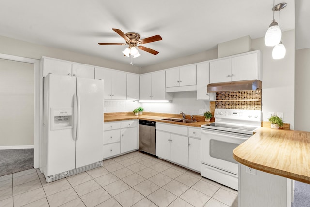 1360 39th Ave, Vero Beach, FL 32960 - kitchen featuring white appliances, under cabinet range hood, ceiling fan, white cabinets, and tasteful backsplash