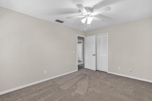 1360 39th Ave, Vero Beach, FL 32960 - unfurnished bedroom featuring carpet flooring, a closet, and ceiling fan