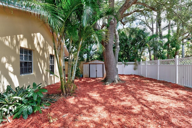 1360 39th Ave, Vero Beach, FL 32960 - fenced backyard with a storage unit