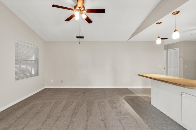1360 39th Ave, Vero Beach, FL 32960 - unfurnished living room with lofted ceiling, carpet, and ceiling fan