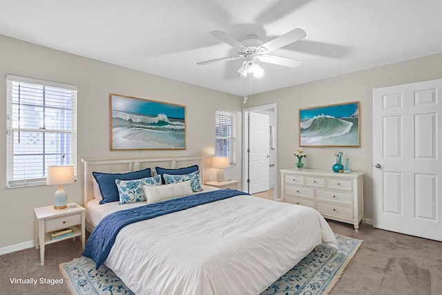1360 39th Ave, Vero Beach, FL 32960 - bedroom featuring light colored carpet, multiple windows, and ceiling fan