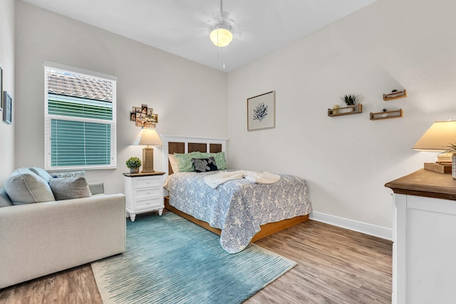 6458 SW Key Deer Ln, Palm City, FL 34990 - bedroom featuring wood finished floors and a ceiling fan